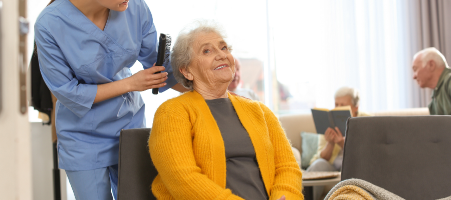 no rinse shampoo vs dry shampoo - older woman getting hair care by nurse